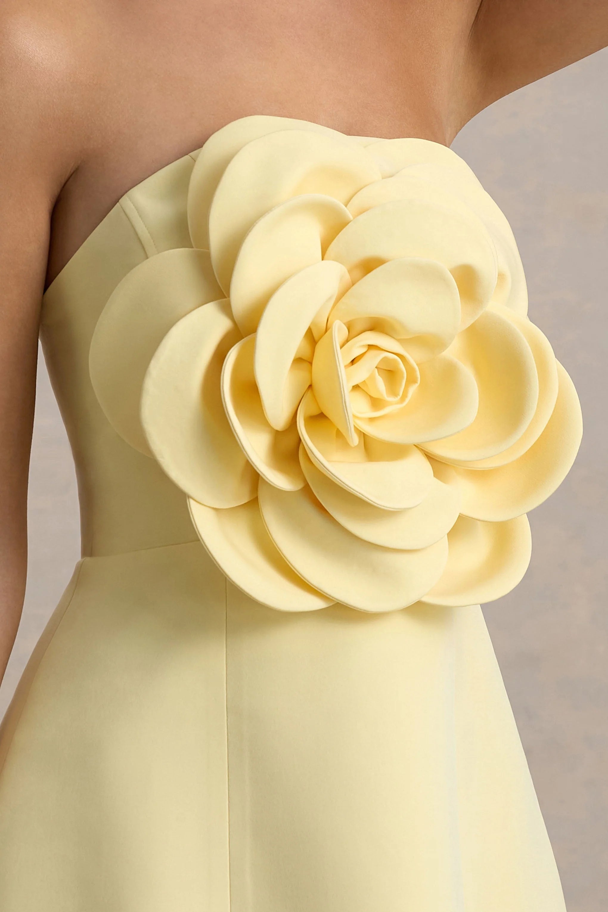daffodil | lemon bandeau mini dress with large floral corsage
